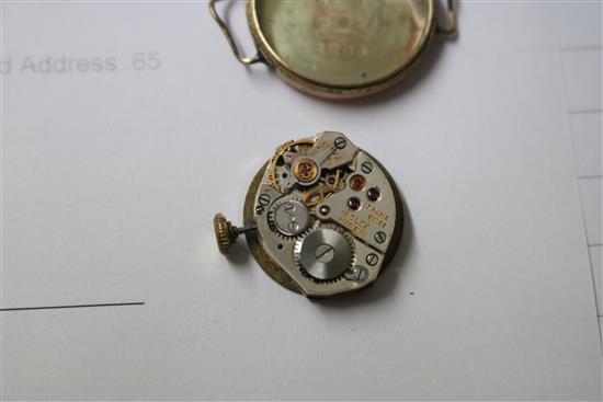 A ladys gold Rolex Precision watch and two other watches.